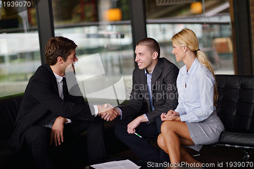 Image of business people in a meeting at office