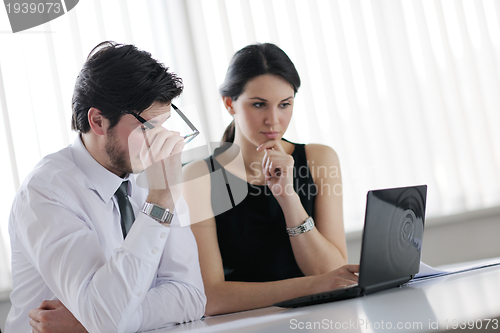 Image of business people in a meeting at office