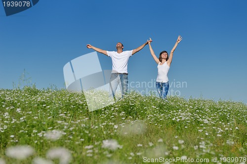 Image of happy couple in wheat field