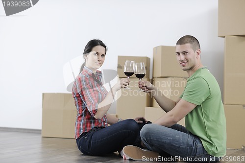 Image of Young couple moving in new home