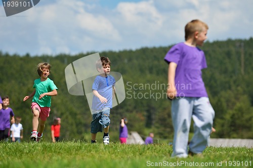 Image of happy kids group  have fun in nature