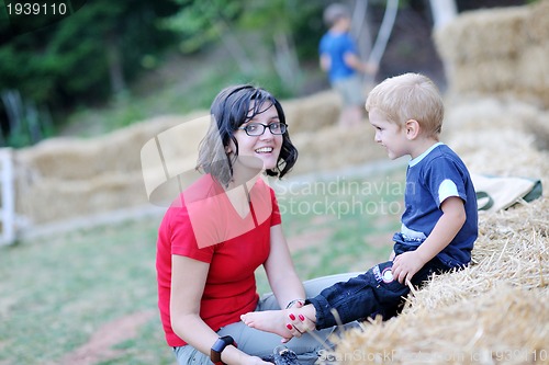 Image of woman and child have fun outdoor