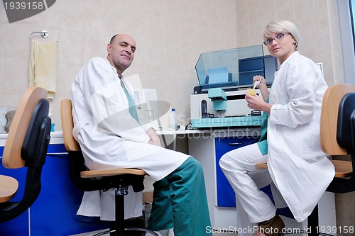 Image of veterinarian and assistant in a small animal clinic