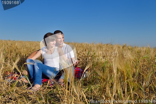 Image of happy couple in wheat field
