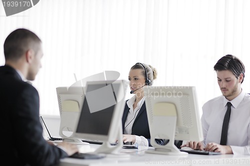 Image of business people group working in customer and help desk office