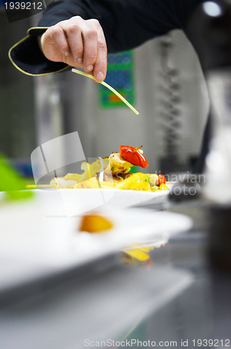 Image of chef preparing meal