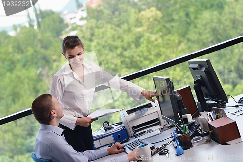 Image of business people in a meeting at office