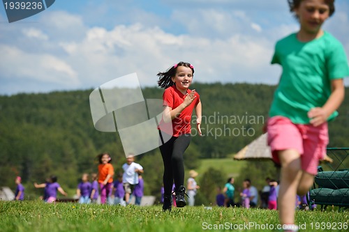 Image of happy kids group  have fun in nature