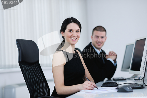 Image of business people group working in customer and help desk office