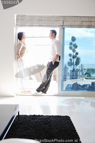 Image of happy young couple relax at home