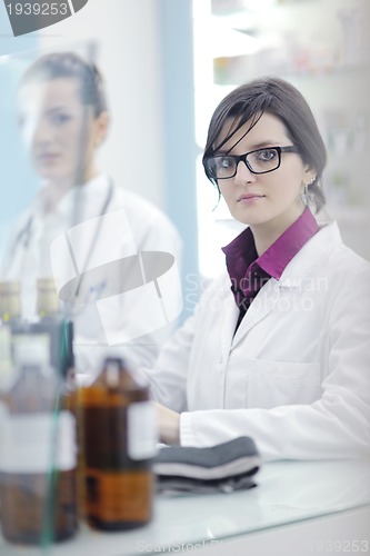 Image of team of pharmacist chemist woman  in pharmacy drugstore