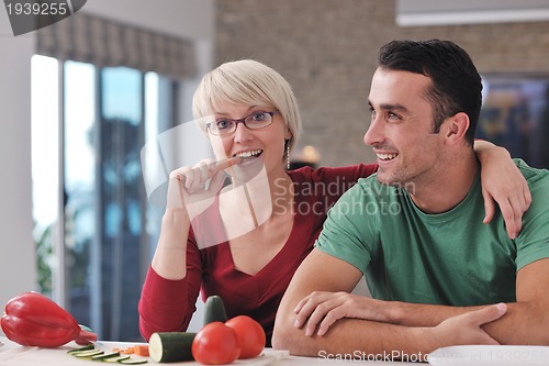 Image of young couple have fun in modern kitchen