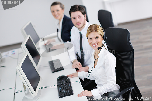 Image of business people group working in customer and help desk office