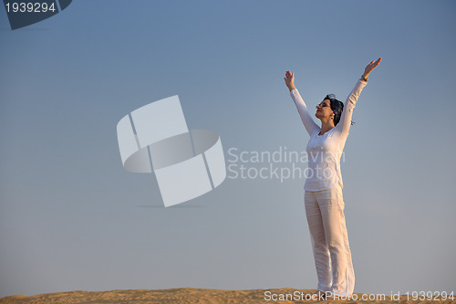 Image of woman relax in desert