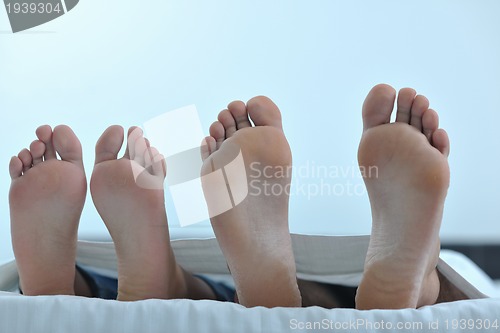 Image of young couple have good time in their bedroom