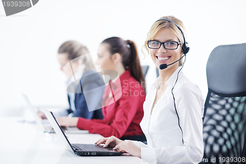 Image of business woman group with headphones