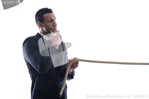 Image of business man with rope isolated on white background