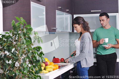 Image of young couple have fun in modern kitchen