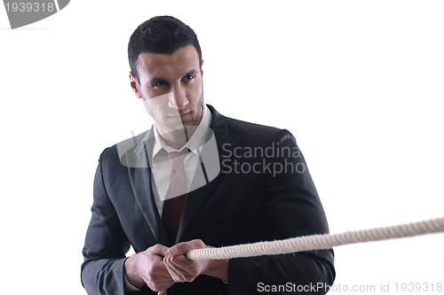 Image of business man with rope isolated on white background