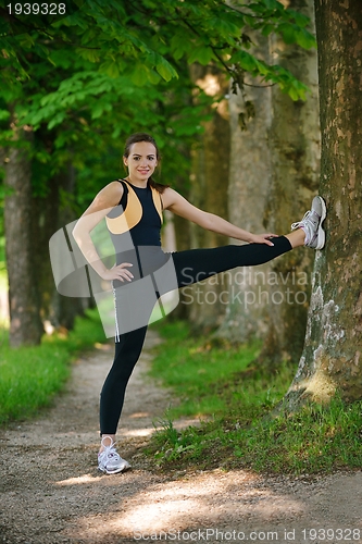 Image of woman stretching before fitness