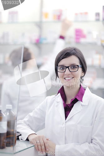 Image of team of pharmacist chemist woman  in pharmacy drugstore