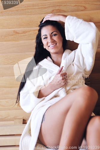 Image of Young woman take a steam bath