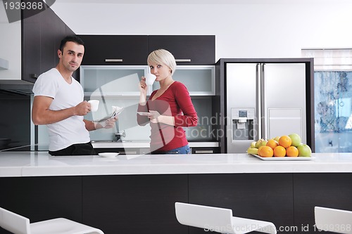Image of young couple have fun in modern kitchen