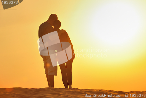 Image of couple enjoying the sunset
