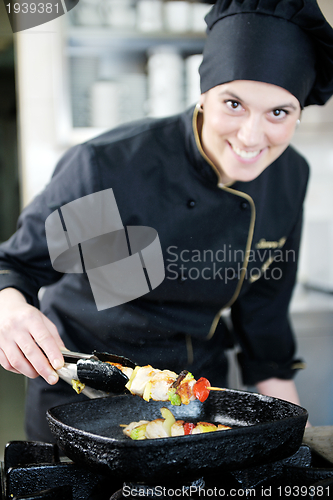 Image of chef preparing meal