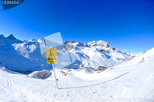 Image of Sign board at High mountains under snow in the winter