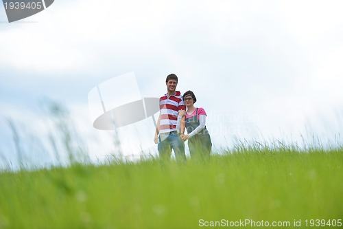 Image of romantic young couple in love together outdoor