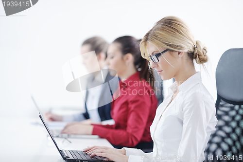 Image of business woman group with headphones