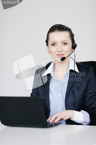 Image of business woman group with headphones