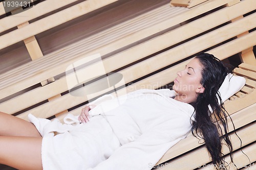 Image of Young woman take a steam bath