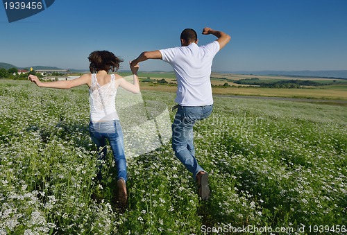 Image of happy couple in wheat field