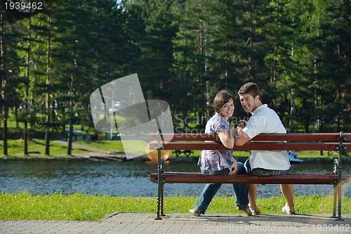 Image of romantic young couple in love together outdoor