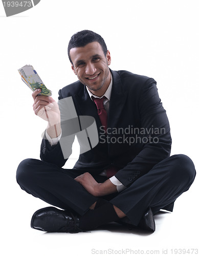 Image of Business man holding money