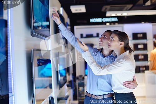 Image of people buy  in consumer electronics store