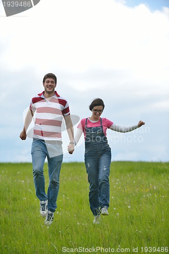 Image of romantic young couple in love together outdoor