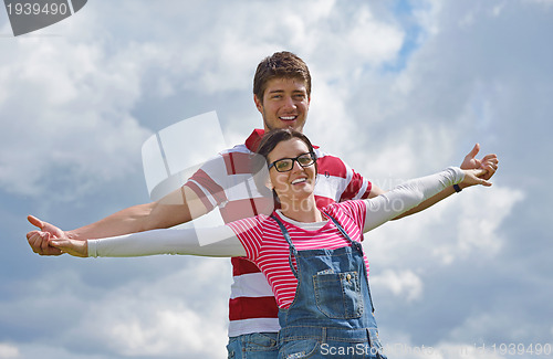 Image of romantic young couple in love together outdoor