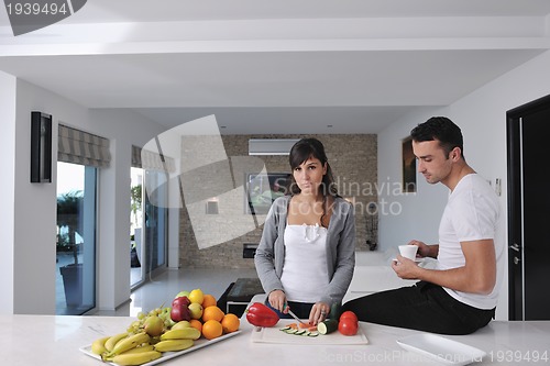 Image of young couple have fun in modern kitchen