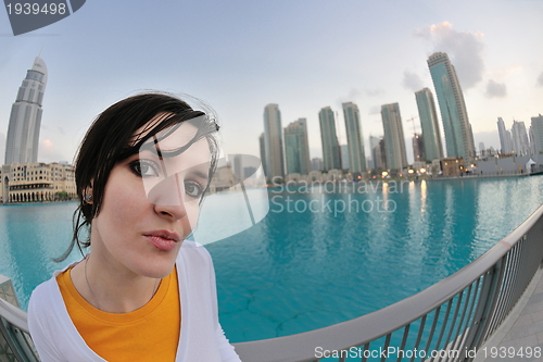 Image of happy tourist woman