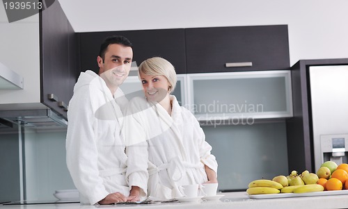Image of young couple have fun in modern kitchen