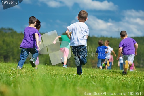 Image of happy kids group  have fun in nature