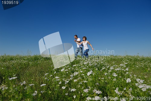 Image of happy couple in wheat field