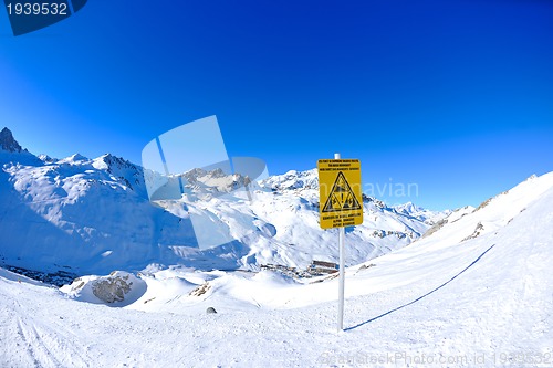 Image of Sign board at High mountains under snow in the winter