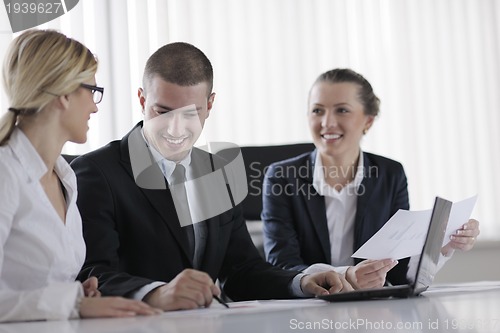 Image of business people in a meeting at office