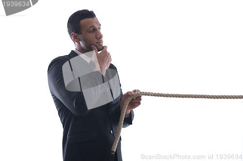 Image of business man with rope isolated on white background