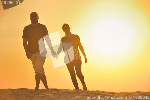 Image of couple enjoying the sunset