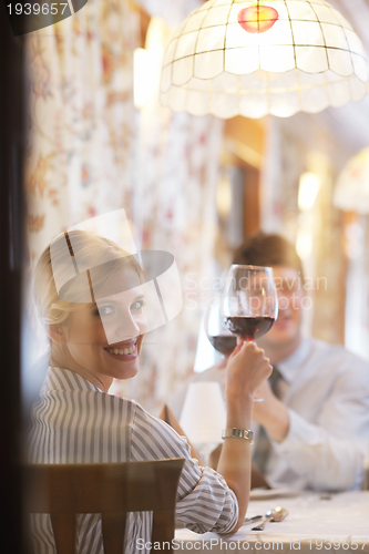 Image of young couple having dinner at a restaurant